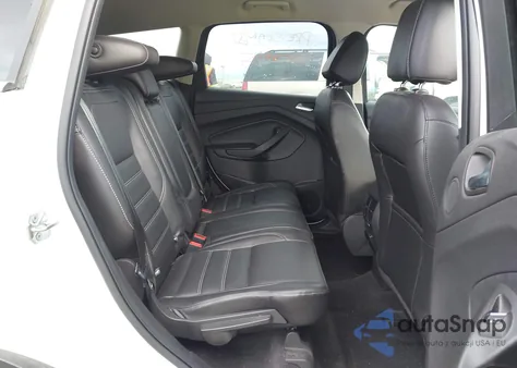 2017 Ford Escape Titanium z USA, uszkodzony, nr VIN 1FMCU9J94HUE48485